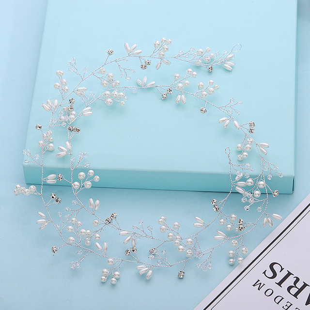 Elegant Wedding Hair Accessories featuring crystal and pearl details, perfect for bridal hairstyles.
