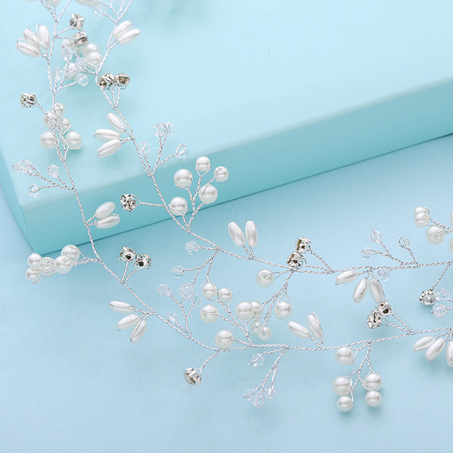 Elegant Wedding Hair Accessories with crystal and pearl details, perfect for bridal looks.