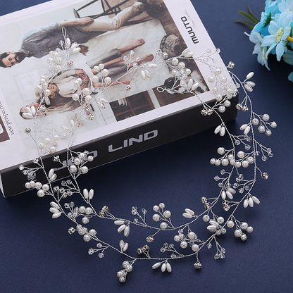 Wedding Hair Accessories featuring a crystal pearl bridal hair band with delicate floral details for brides.
