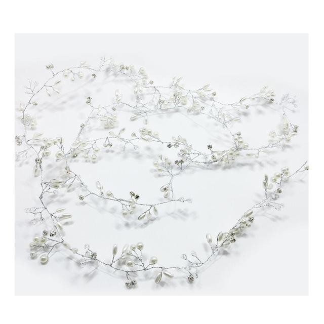 Wedding Hair Accessories featuring elegant crystal and pearl details on a delicate hair vine.